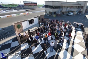 Morning Rider's Meeting: The track riders hear the rules of the road.